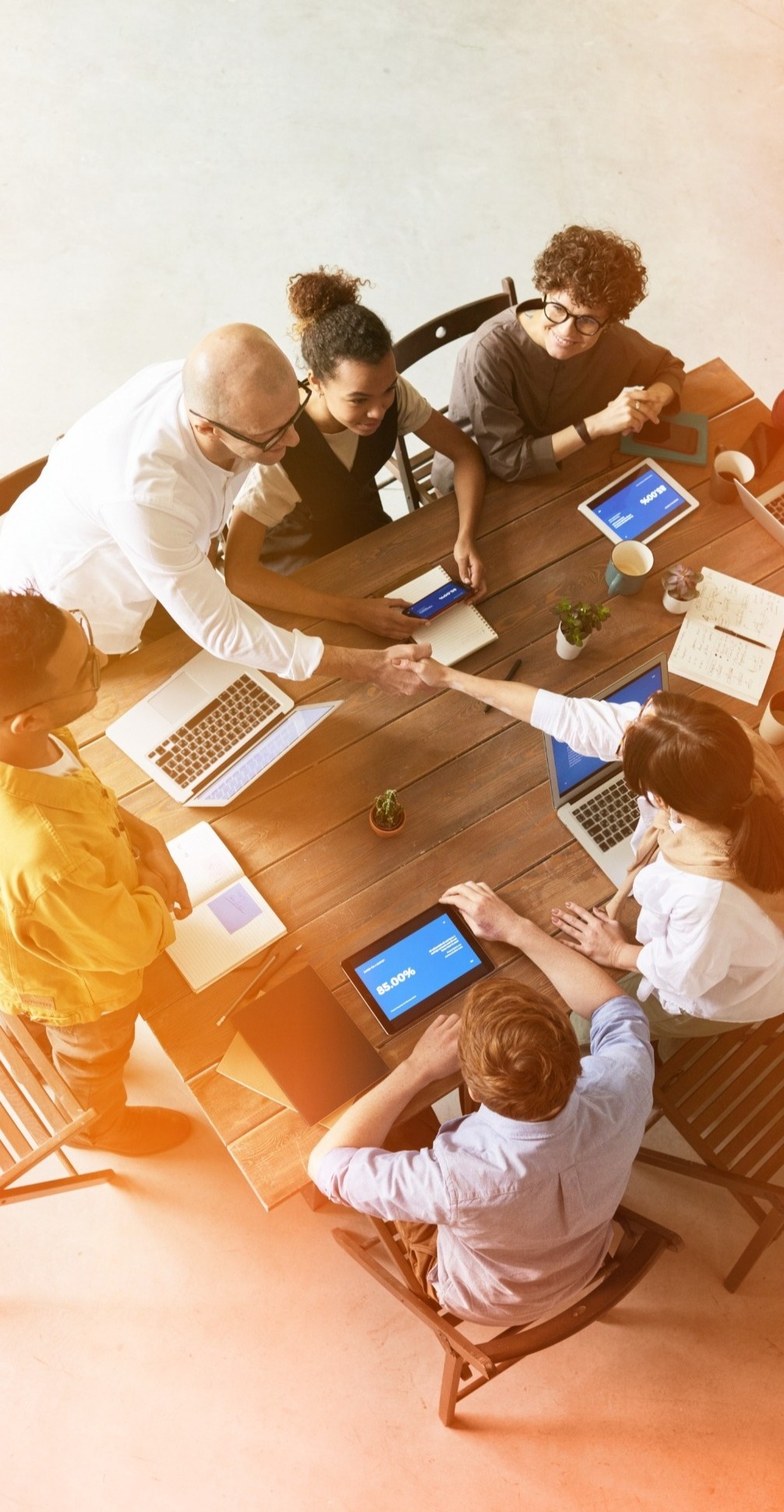 McChrystalGroup-Capabilities-Simulations.jpg Team Working Together at Table
